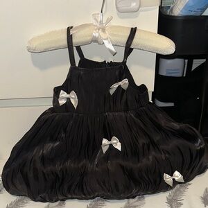 Elegant Black Dress with White Bows